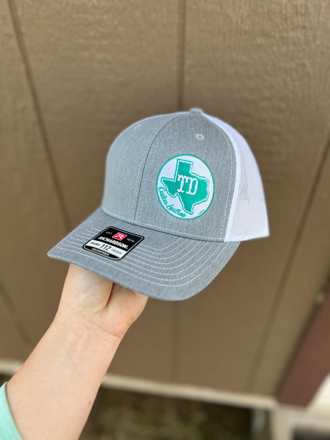 Grey Corner Hat Logo