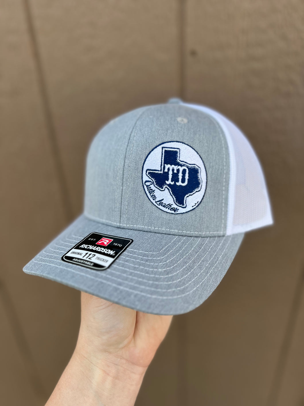 Grey Corner Hat Logo